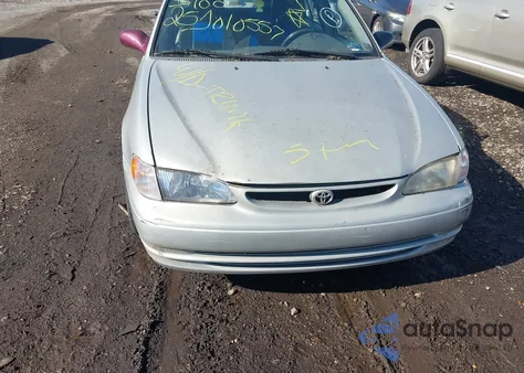 1999 Toyota Corolla Le z USA, uszkodzony, nr VIN 2T1BR18E9XC202565